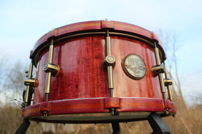 Purpleheart and bubinga stave snare drum with matching wood hoops and antique bronze hardware