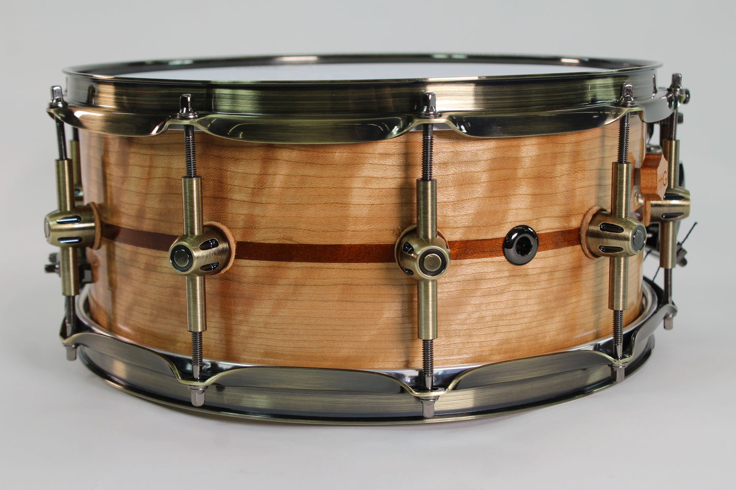 Quilted Birch and maple 8 ply snare drum with antique bronze hardware