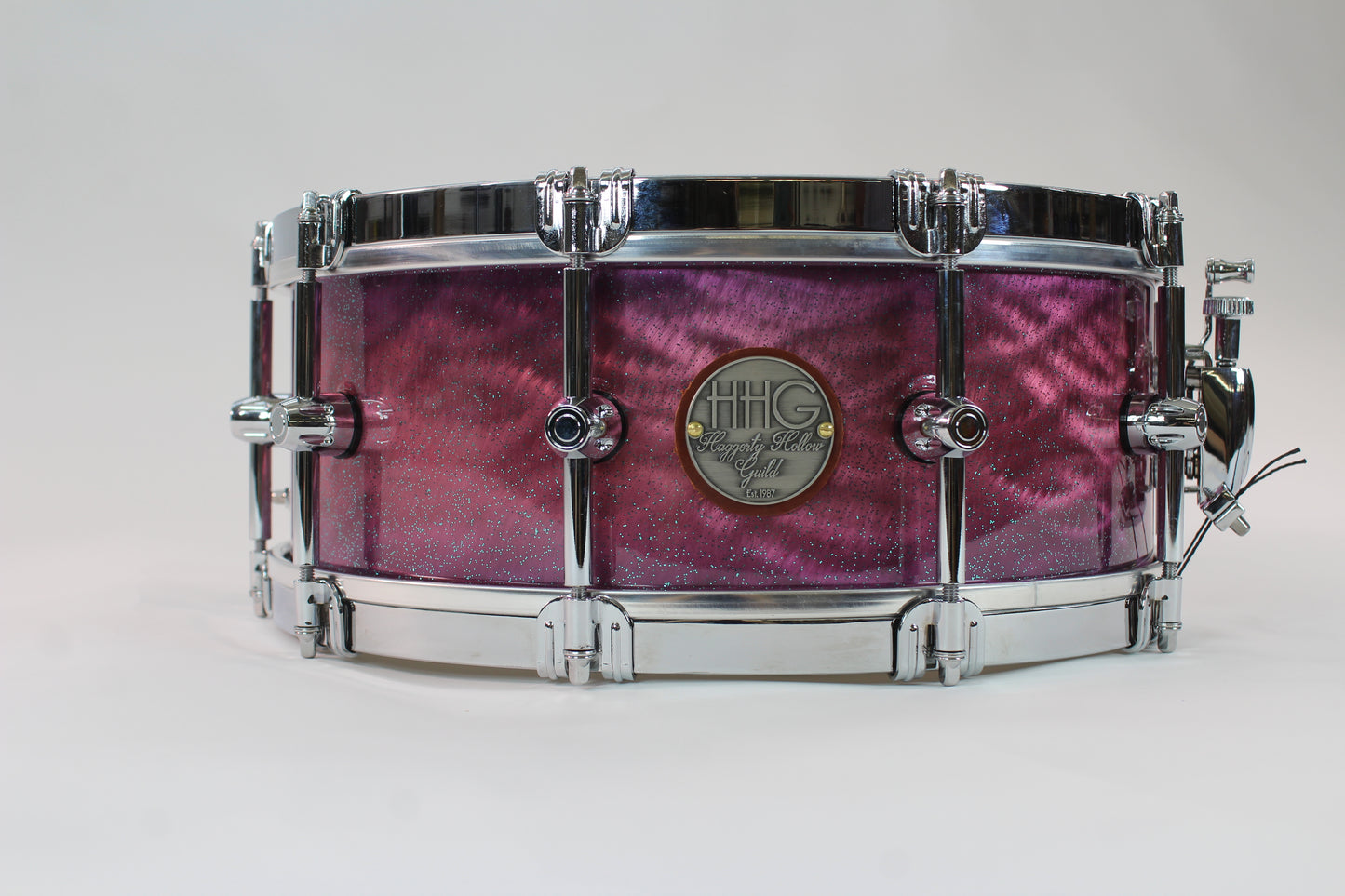 Brushed aluminum snare drum with purple candy burst high gloss lacquer