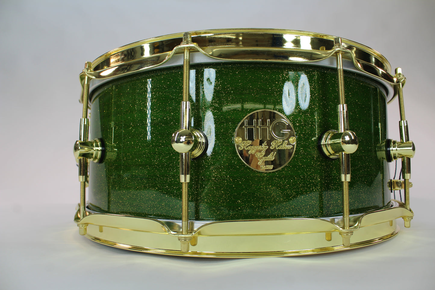 Curly Maple Stave Snare Drum with Green Metallic Flake High Gloss Lacquer & Gold Hardware