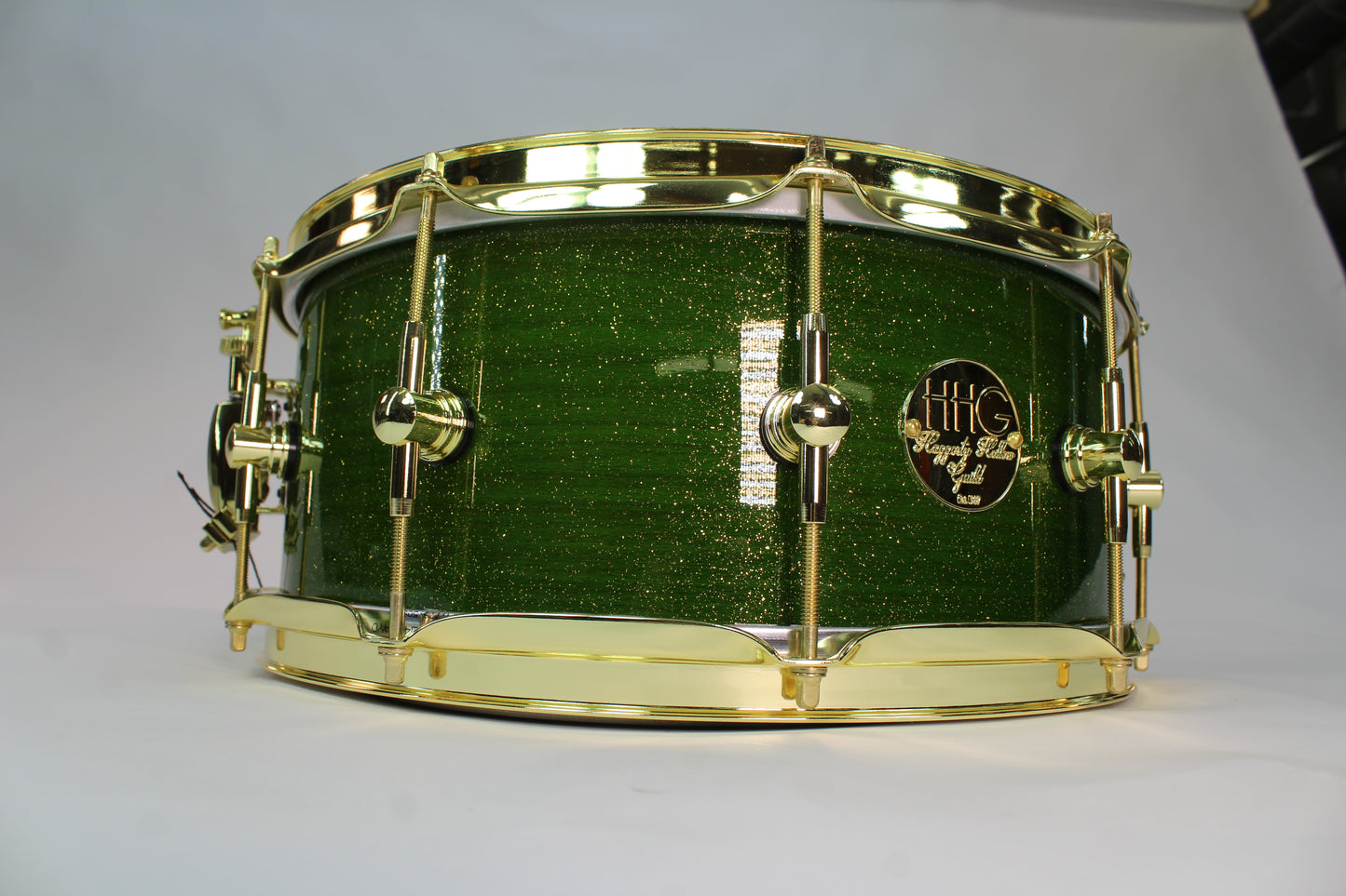 Curly Maple Stave Snare Drum with Green Metallic Flake High Gloss Lacquer & Gold Hardware