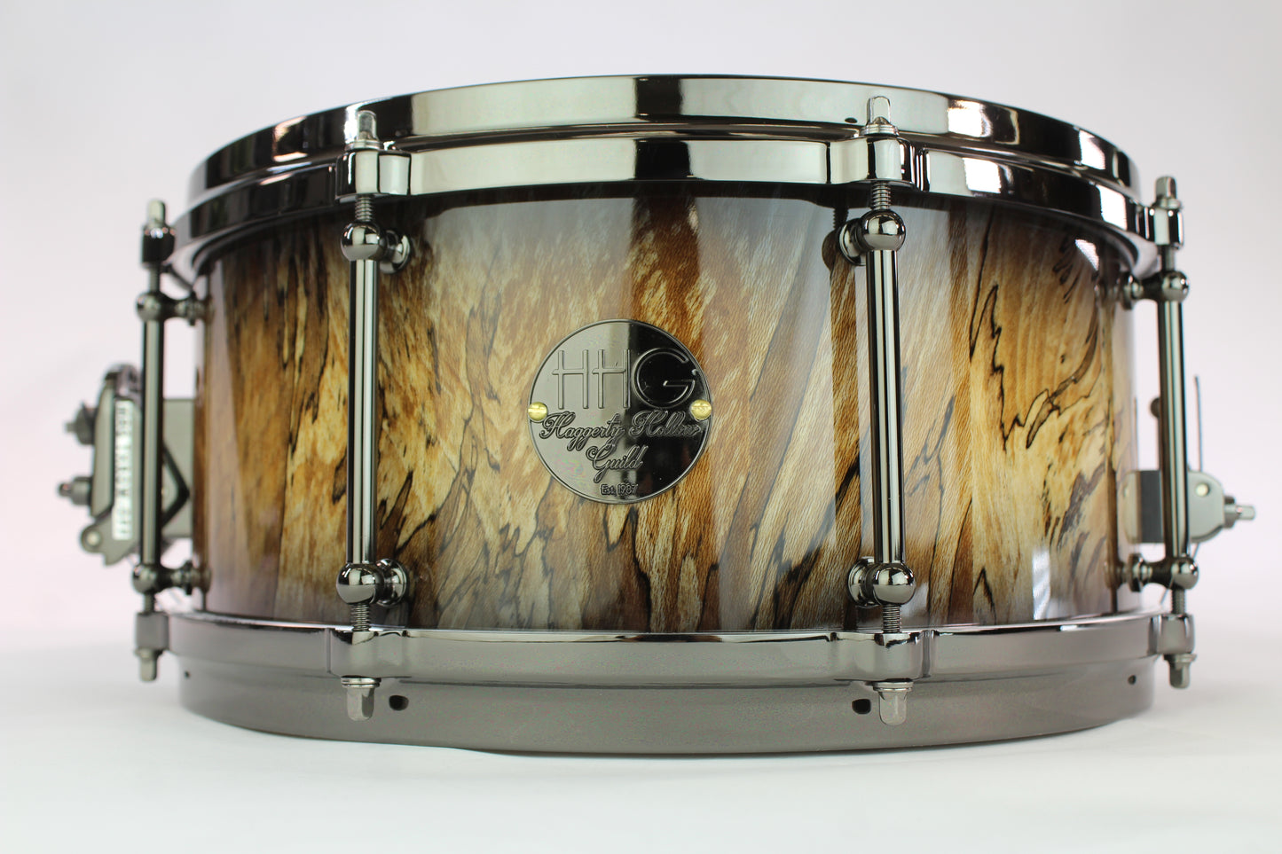 Spalted sycamore stave snare drum with natural to black burst high close lacquer and black nickel hardware
