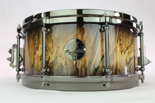 Spalted sycamore stave snare drum with natural to black burst high close lacquer and black nickel hardware
