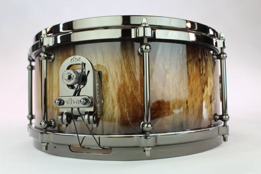 Spalted sycamore stave snare drum with natural to black burst high close lacquer and black nickel hardware